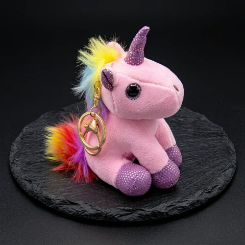 Porte clé licorne en peluche brillante rose avec corne violette, queue arc-en-ciel et anneau doré