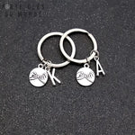 Porte clés pour couple initiale en duo
