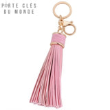 Porte clé pompon rose en cuir pour femme avec franges élégantes et anneau doré