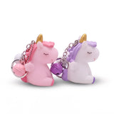 Porte-clés licorne avec ailes en versions rose et violet, corne dorée, grelot et anneau métallique