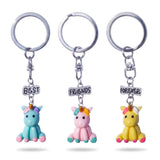 Trois porte-clés licorne Best Friends Forever bleu, rose et jaune avec pendentifs assortis à partager entre amis