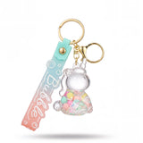 Porte-clé licorne bulle transparent avec perles pastel multicolores