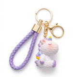 Porte-clé licorne Crochet, licorne blanche aux détails violets avec corne multicolore et mousqueton doré