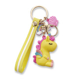 Porte clé licorne emoji jaune et rose avec dragonne jaune, arc-en-ciel, coquillage et mousqueton doré