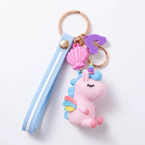 Porte clé licorne emoji rose et bleu avec dragonne bleu pastel, coquillage rose et anneau doré