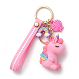 Porte clé licorne emoji rose avec dragonne assortie, breloques arc-en-ciel et coquillage