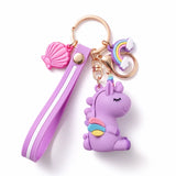 Porte clé licorne emoji violet avec dragonne, breloques arc-en-ciel et coquillage, anneau et mousqueton dorés