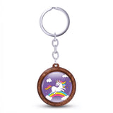 Porte-clé licorne en bois violet avec licorne sur un arc-en-ciel