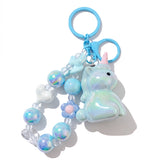 Porte Clé Licorne en Cristal bleu irisé avec bracelet de perles