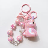 Porte Clé Licorne en Cristal rose pastel avec perles brillantes