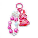 Porte Clef Licorne Cristal rose fuchsia avec perles brillantes, anneau et mousqueton rose