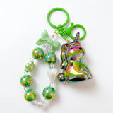 Porte Clé Licorne en Cristal vert multicolore irisé avec perles vertes