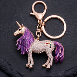 Porte clé licorne grande crinière violette à finition dorée, serti de strass, avec anneau et mousqueton