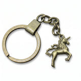 Porte-clé licorne métallique finition bronze avec anneau et chaîne