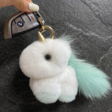 Porte clé licorne en peluche blanche et vert menthe avec queue duveteuse, corne dorée et mousqueton