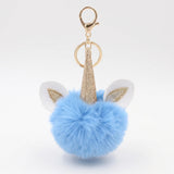 Porte-clé licorne pompon bleu ciel avec mousqueton doré