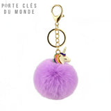 Porte clé licorne pompon violet clair sur fond blanc, bijou de sac licorne doux et kawaii