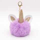 Porte-clé licorne pompon violet pastel avec oreilles blanches et corne dorée