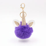 Porte-clé licorne pompon violet avec oreilles et corne dorée