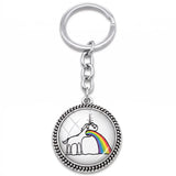 Porte-clé rond argenté avec licorne vomissant un arc-en-ciel