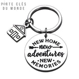 porte clé nouvelle maison en acier inoxydable gravé "new home new adventures new memories" sur fond blanc 