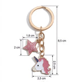 Porte-clé tête de licorne rose, longueur totale de 8,5 cm, tête de 2,5 × 2,5 cm et étoile de 1,8 × 2 cm