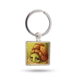 Porte clé tortue cabochon carré sur fond blanc