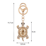 Dimensions du porte clé tortue gros diamant champagne avec hauteur de 11,7 cm et tortue 6cm de haut et 3,5 cm de large 