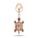 Porte clé tortue gros diamant rose avec cristaux facettés et strass brillants