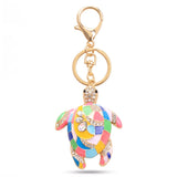 Porte clé tortue motif mosaïque rose et multicolore avec strass