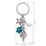 Dimensions du porte clé tortue océan avec coquillage, tortue turquoise et queue de baleine
