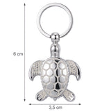 Dimensions du porte clé tortue original phosphorescent de 6 cm de hauteur et 3,5 cm de largeur