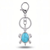 Porte clé tortue pierre turquoise bleue avec veinures foncées