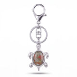 Porte clé tortue pierre unakite multicolore avec détails rouges et verts