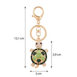 Porte clé tortue zircon vert et doré avec dimensions : 12,1 cm de hauteur total, et la tortue 5,9cm de hauteur sur 3 cm de largeur