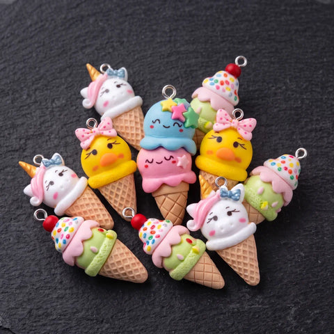 Porte-clés licorne Candy en quatre variantes : licorne, canard, glace double boule et glace avec cerise