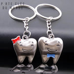 porte-clés couple dent qui sourit comme un couple amoureux