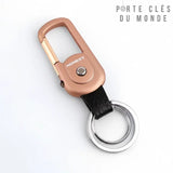 Porte clés femme design lumineux sur fond blanc, couleur rose et or avec lampe LED intégrée