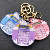 Porte-clés licorne calculatrice disponibles en bleu, violet et rose