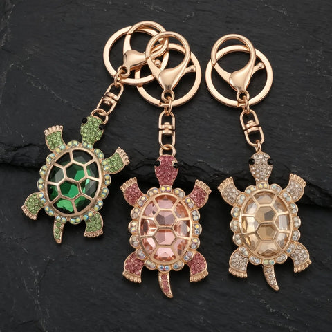 Porte clé tortue gros diamant décliné en vert émeraude, rose et champagne