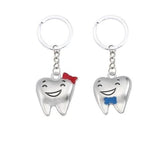 Porte clé couple dent souriante